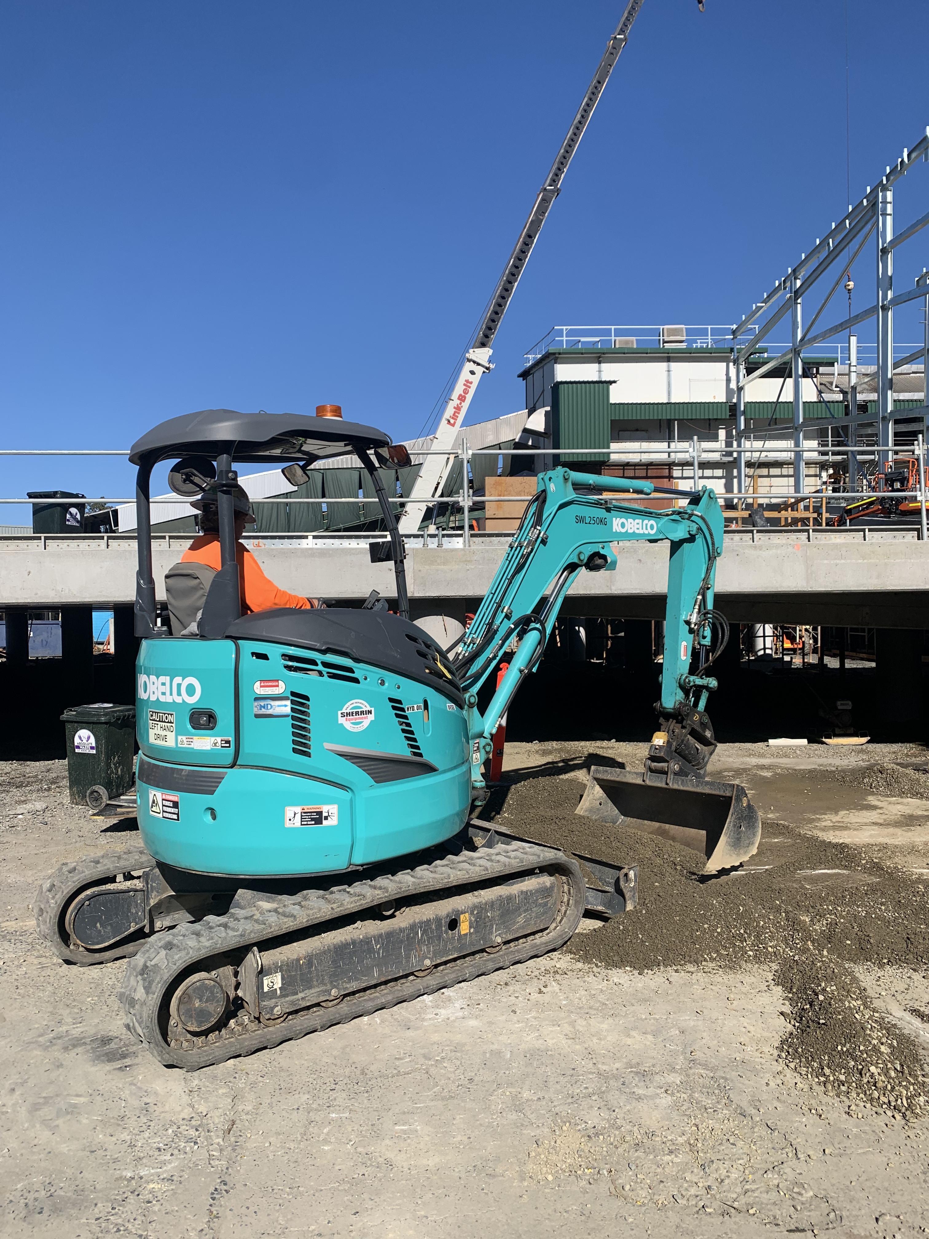 Kobelco mini excavator on a residential construction site in Rockhampton